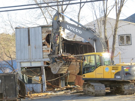 excavator taking down the walls of Autoware