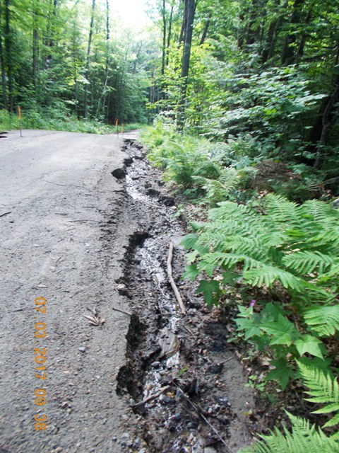 crumbling road pavement