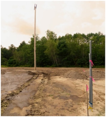 poles and dirt installation at new Elliot Field