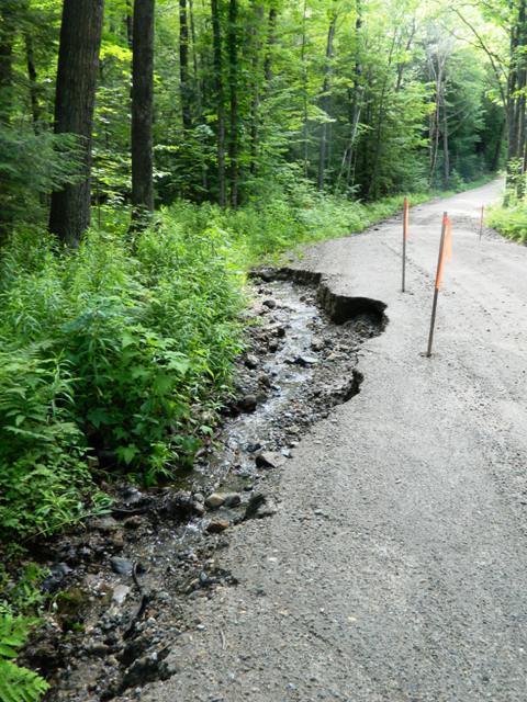 ditch erosion cutting into road