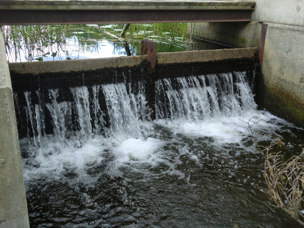 water going over dam