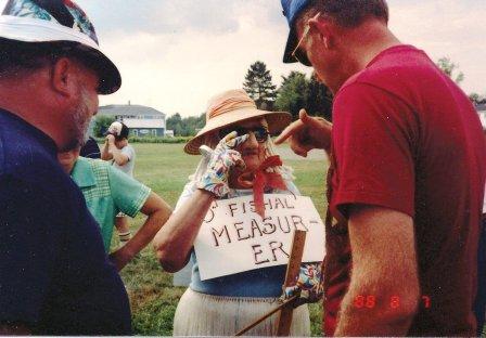 woman dressed as the "official measurer"