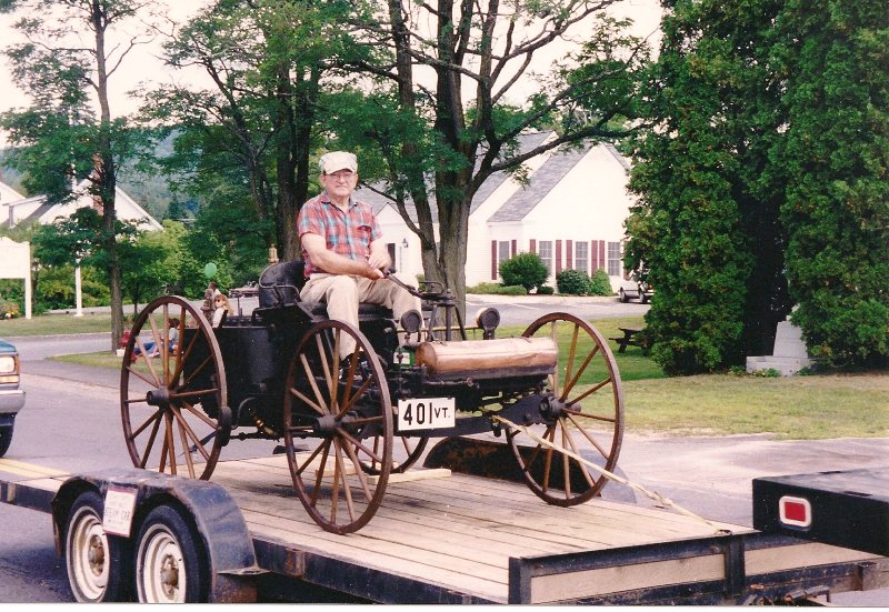 early car on wagon type wheels