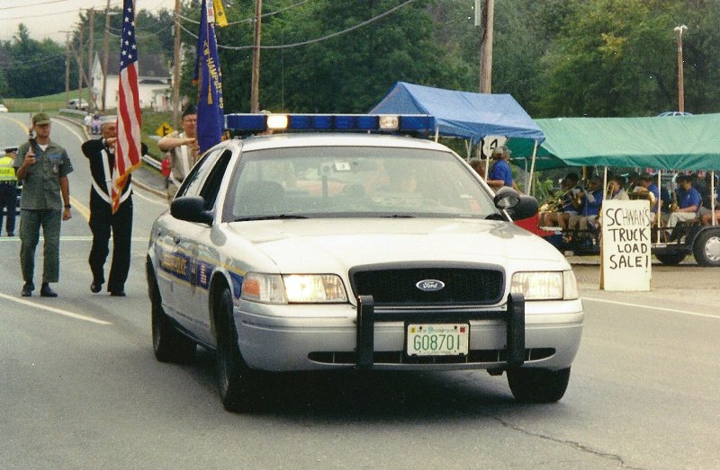 police car leading parade