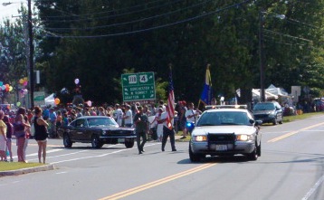 police car leading the parade